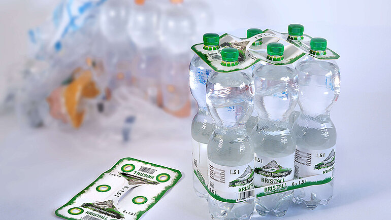 PET bottles with cardboard packaging instead of plastic